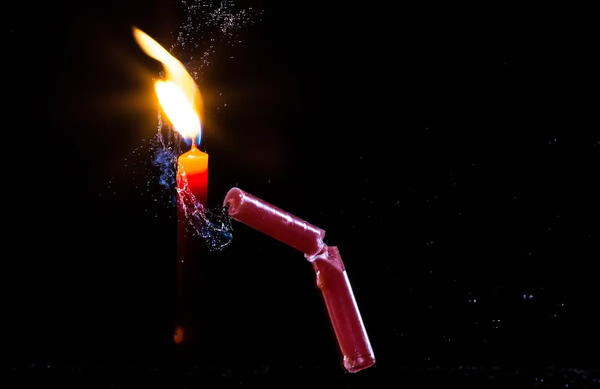 Candle struck with water.