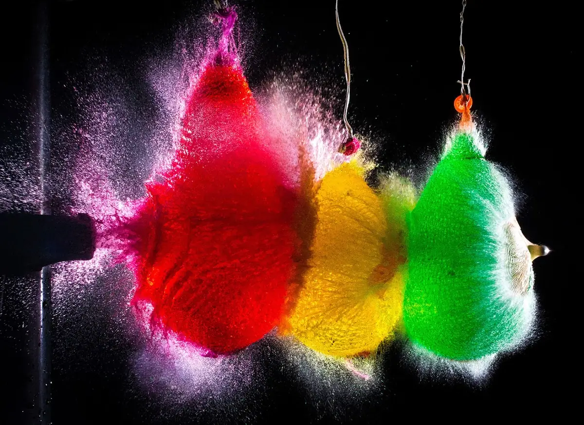 Fish hit by coloured powder.
